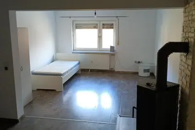 Ein Bett oder Betten in einem Zimmer der Unterkunft NEU! FeWo Skalstr. Philippsburg