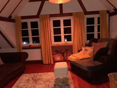Ein Sitzbereich in der Unterkunft Fachwerkhaus mitten in der Natur