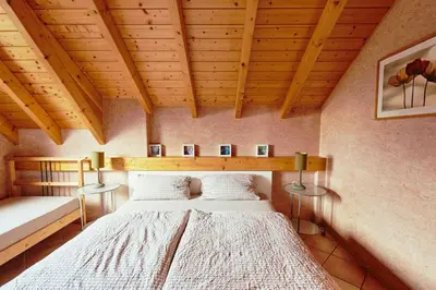 Ein Bett oder Betten in einem Zimmer der Unterkunft Ferienwohnung Lisa 95qm, angenehm ruhig
