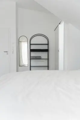 Ein Bett oder Betten in einem Zimmer der Unterkunft Moderne Unterkünfte in Walldorf