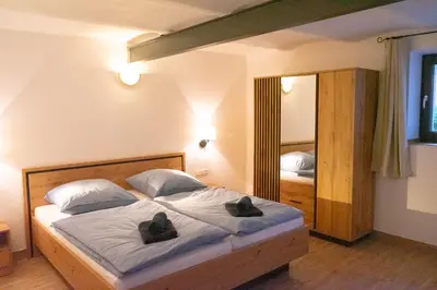 Ein Bett oder Betten in einem Zimmer der Unterkunft Ferienwohnung 