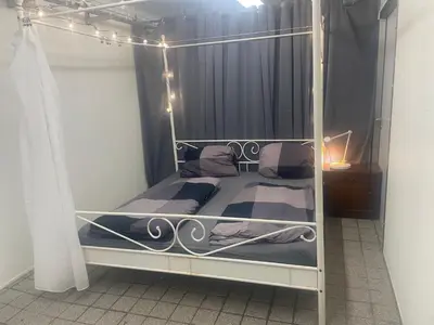 Ein Bett oder Betten in einem Zimmer der Unterkunft Günstige ruhige Unterkunft