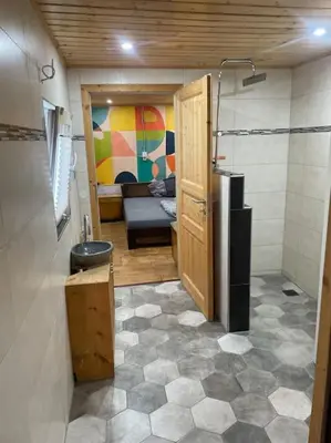 Ein Bett oder Betten in einem Zimmer der Unterkunft Cozy Tiny House mit WLAN & Sauna