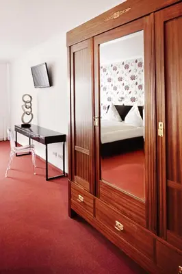 Ein Bett oder Betten in einem Zimmer der Unterkunft Hotel Apartment Laforsch