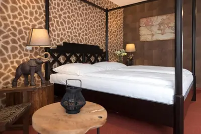 Ein Bett oder Betten in einem Zimmer der Unterkunft Hotel Apartment Laforsch