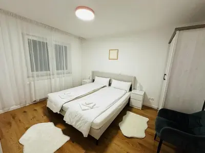 Ein Bett oder Betten in einem Zimmer der Unterkunft Luxus Reihenmittelhaus