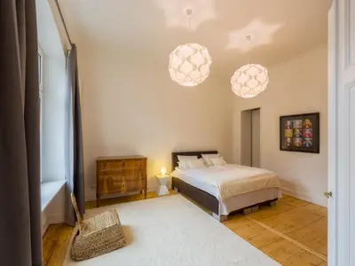 Ein Bett oder Betten in einem Zimmer der Unterkunft Zweite Heimat Heidelberg