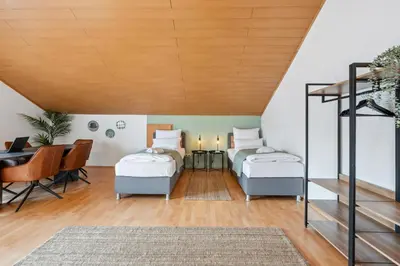 Ein Bett oder Betten in einem Zimmer der Unterkunft Mozartshomes#3 2,5 Rooms 6 Beds in Löchgau