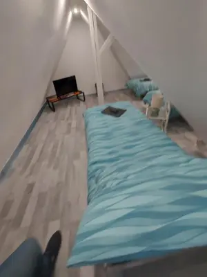 Ein Bett oder Betten in einem Zimmer der Unterkunft GRooms