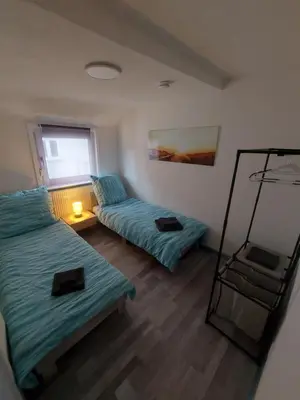 Ein Bett oder Betten in einem Zimmer der Unterkunft GRooms
