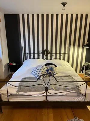 Ein Bett oder Betten in einem Zimmer der Unterkunft TinyStory - das Appartement mit Hotelgefühl in Obernburg