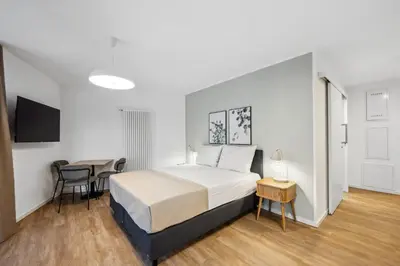 Ein Bett oder Betten in einem Zimmer der Unterkunft Limehome Karlsruhe Sophienstr