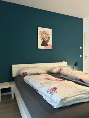 Ein Bett oder Betten in einem Zimmer der Unterkunft Zentrale Lage Netflix