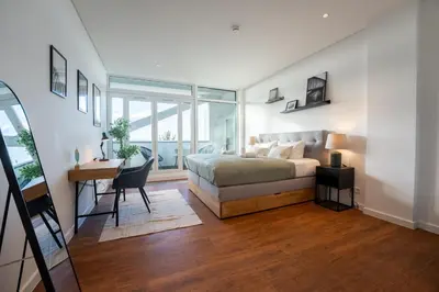 Ein Bett oder Betten in einem Zimmer der Unterkunft SCHLOSSBERG RESIDENCES - 3 Glocken Luxury PENTHOUSE-Apartments