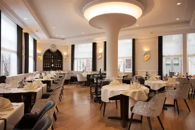 Ein Restaurant oder anderes Speiselokal in der Unterkunft Kleiner Rosengarten