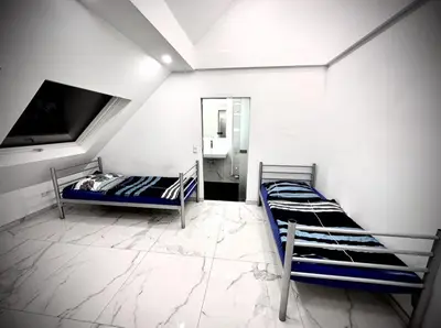 Ein Bett oder Betten in einem Zimmer der Unterkunft Apartment