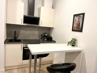 Küche/Küchenzeile in der Unterkunft Goldstadt Cozy Smart Suite - City Apartament Schlössle