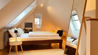 Ein Bett oder Betten in einem Zimmer der Unterkunft LudwigsHome Zentral, Spacious, 120qm, Klima