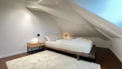 Ein Bett oder Betten in einem Zimmer der Unterkunft LudwigsHome Zentral, Spacious, 120qm, Klima