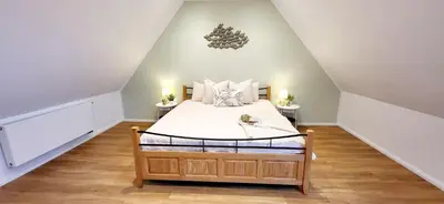 Ein Bett oder Betten in einem Zimmer der Unterkunft Flair bei Speyer