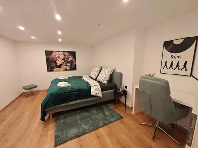 Ein Bett oder Betten in einem Zimmer der Unterkunft New 3 Zimmer Wohnung