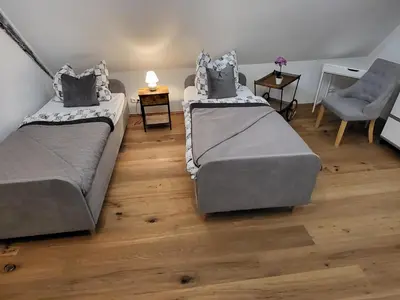 Ein Bett oder Betten in einem Zimmer der Unterkunft Unterkunft Kostera DG
