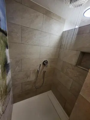 Ein Badezimmer in der Unterkunft Unterkunft Kostera DG