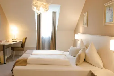 Ein Bett oder Betten in einem Zimmer der Unterkunft Hotel Luise