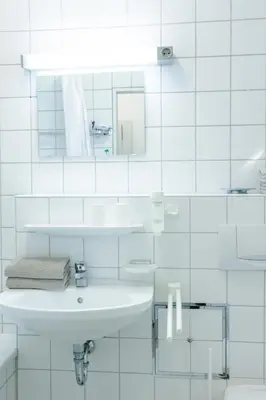 Ein Badezimmer in der Unterkunft Hotel Luise