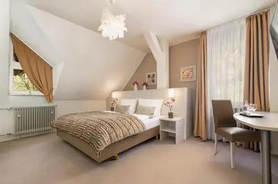 Ein Bett oder Betten in einem Zimmer der Unterkunft Hotel Luise