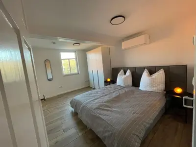 Ein Bett oder Betten in einem Zimmer der Unterkunft DenkMal Auszeit