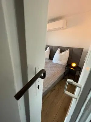 Ein Bett oder Betten in einem Zimmer der Unterkunft DenkMal Auszeit