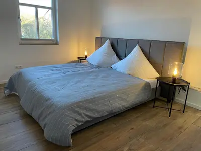 Ein Bett oder Betten in einem Zimmer der Unterkunft DenkMal Auszeit