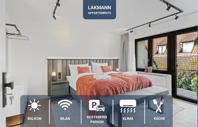 Ein Bett oder Betten in einem Zimmer der Unterkunft 1-2 Personen - Parkplatz - Fahrradgarage - Zentrum - Küche - Balkon - Klima