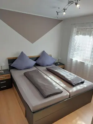 Ein Bett oder Betten in einem Zimmer der Unterkunft Haus Petra