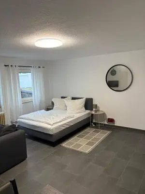 Ein Bett oder Betten in einem Zimmer der Unterkunft City Retreat - Wohnung im ruhigen Hof