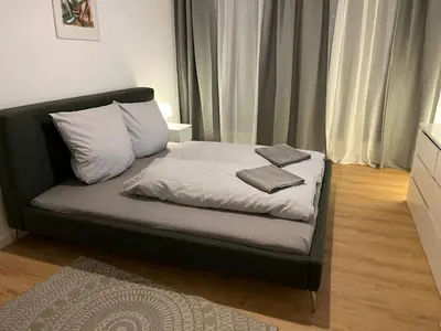 Ein Bett oder Betten in einem Zimmer der Unterkunft Süße Marie Durlach 12