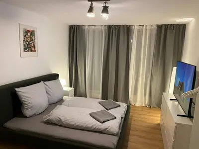 Ein Bett oder Betten in einem Zimmer der Unterkunft Süße Marie Durlach 12