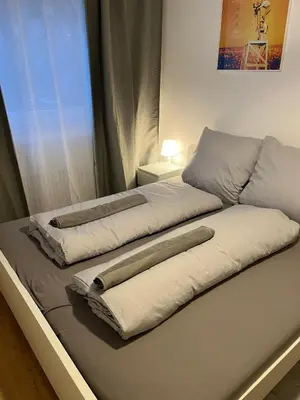 Ein Bett oder Betten in einem Zimmer der Unterkunft Süße Marie Durlach 14