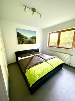 Ein Bett oder Betten in einem Zimmer der Unterkunft Underground - Modern holiday apartment Pfungstadt