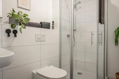 Ein Badezimmer in der Unterkunft Loftdesign 7 Personen Boxspring Frankenthal Ludwigshafen BASF
