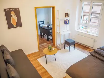 Ein Sitzbereich in der Unterkunft Charming old town apartment - Central in Neustadt