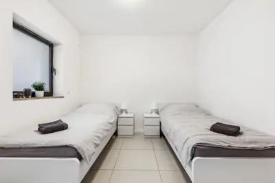 Ein Bett oder Betten in einem Zimmer der Unterkunft MONTEUR - Unterkunft für bis zu 3 Personen in 64569 Nauheim - GG10