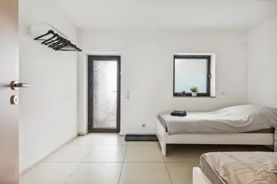Ein Bett oder Betten in einem Zimmer der Unterkunft MONTEUR - Unterkunft für bis zu 3 Personen in 64569 Nauheim - GG10