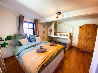 Ein Bett oder Betten in einem Zimmer der Unterkunft Familien Glück