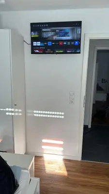 TV/Unterhaltungsangebot in der Unterkunft City Rooms Tamm
