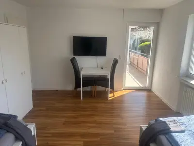 TV/Unterhaltungsangebot in der Unterkunft City Rooms Tamm