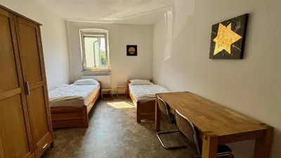 Ein Bett oder Betten in einem Zimmer der Unterkunft Hammer & Rest WHG2