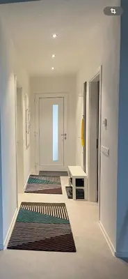 Ein Bett oder Betten in einem Zimmer der Unterkunft Ferienhaus Lindenallee 20
