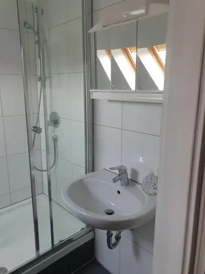 Ein Badezimmer in der Unterkunft Gemütliche Dachsuite im Herzen von Heilbronn